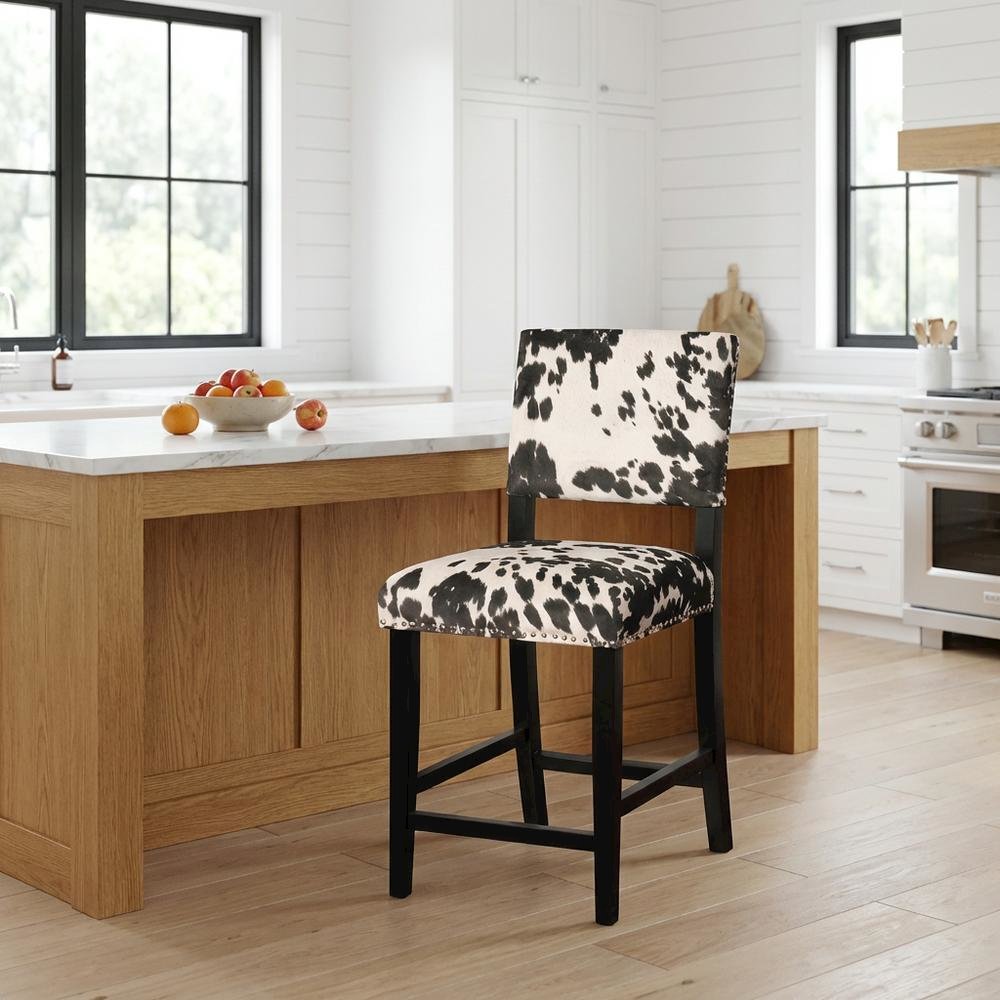 Black Cow Print Counter Stool with Foam Cushioned Seat and Wooden Frame. Picture 2