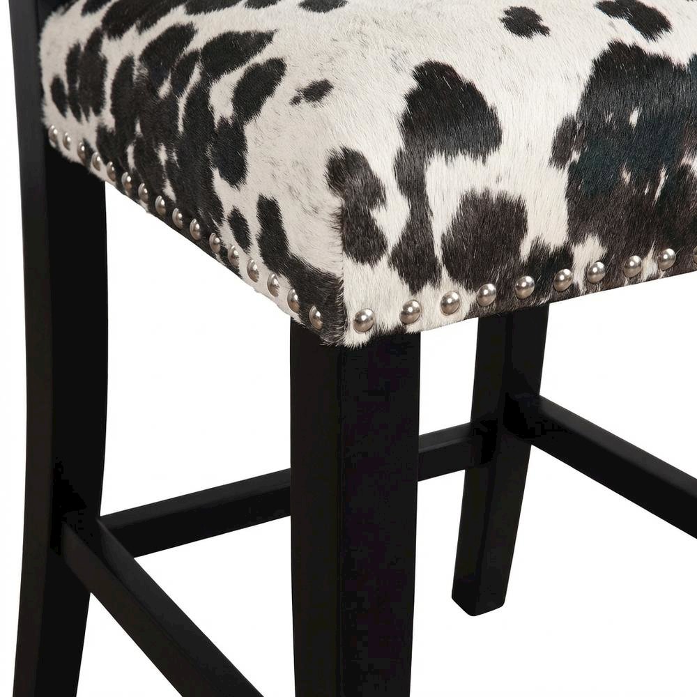 Black Cow Print Counter Stool with Foam Cushioned Seat and Wooden Frame. Picture 6