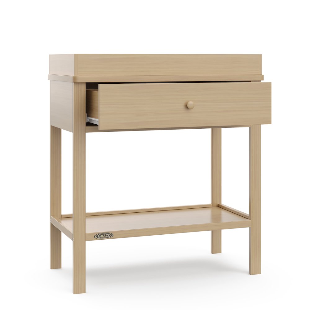 Graco Storage Changing Table - Driftwood. Picture 1