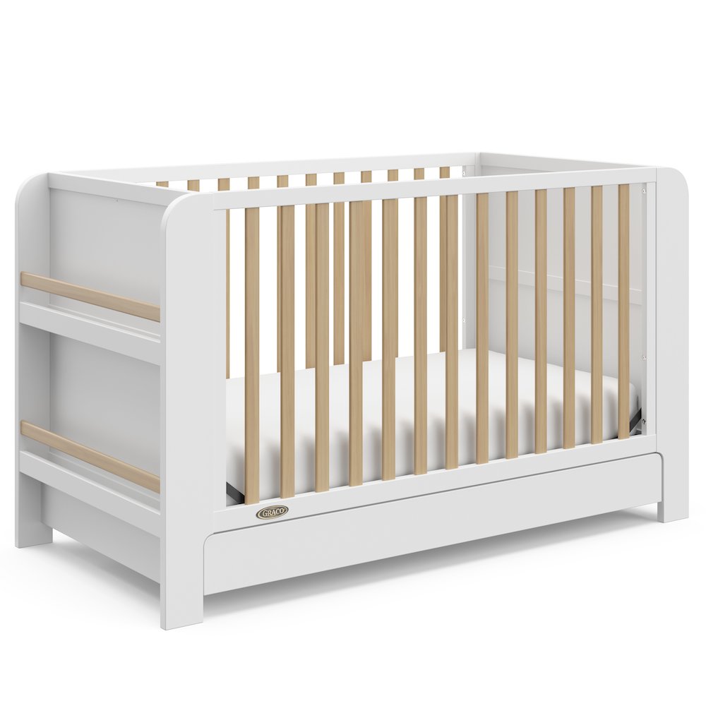 Graco Read-with-Me 4-in-1 Convertible Crib with Drawer (White with Driftwood). Picture 1