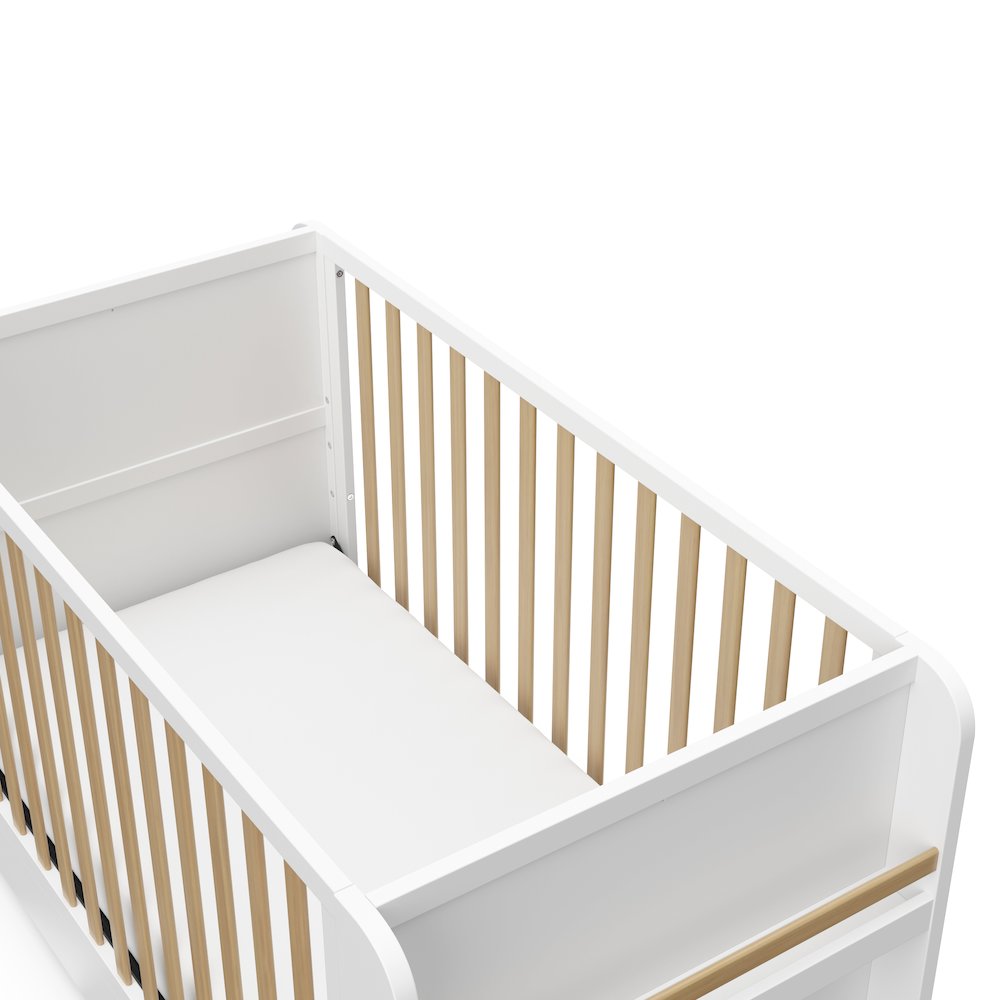 Graco Read-with-Me 4-in-1 Convertible Crib with Drawer (White with Driftwood). Picture 5