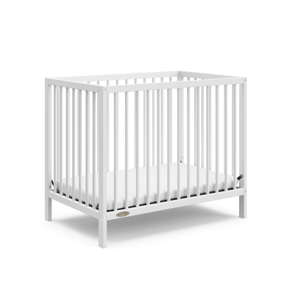Graco Teddi 4-in-1 Convertible Mini Crib - White. Picture 1