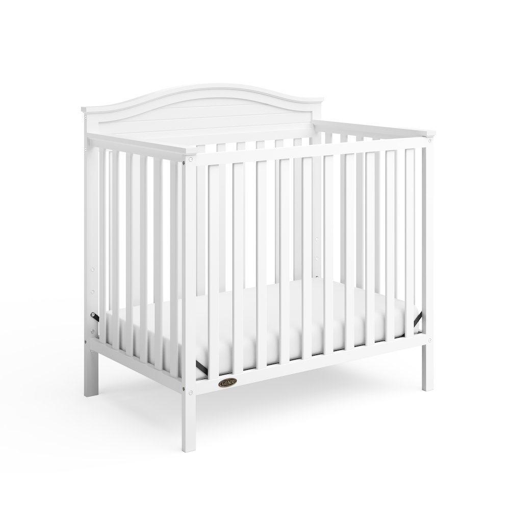 Graco Stella 4-in-1 Convertible Mini Crib with Bonus Mattress - White. Picture 1