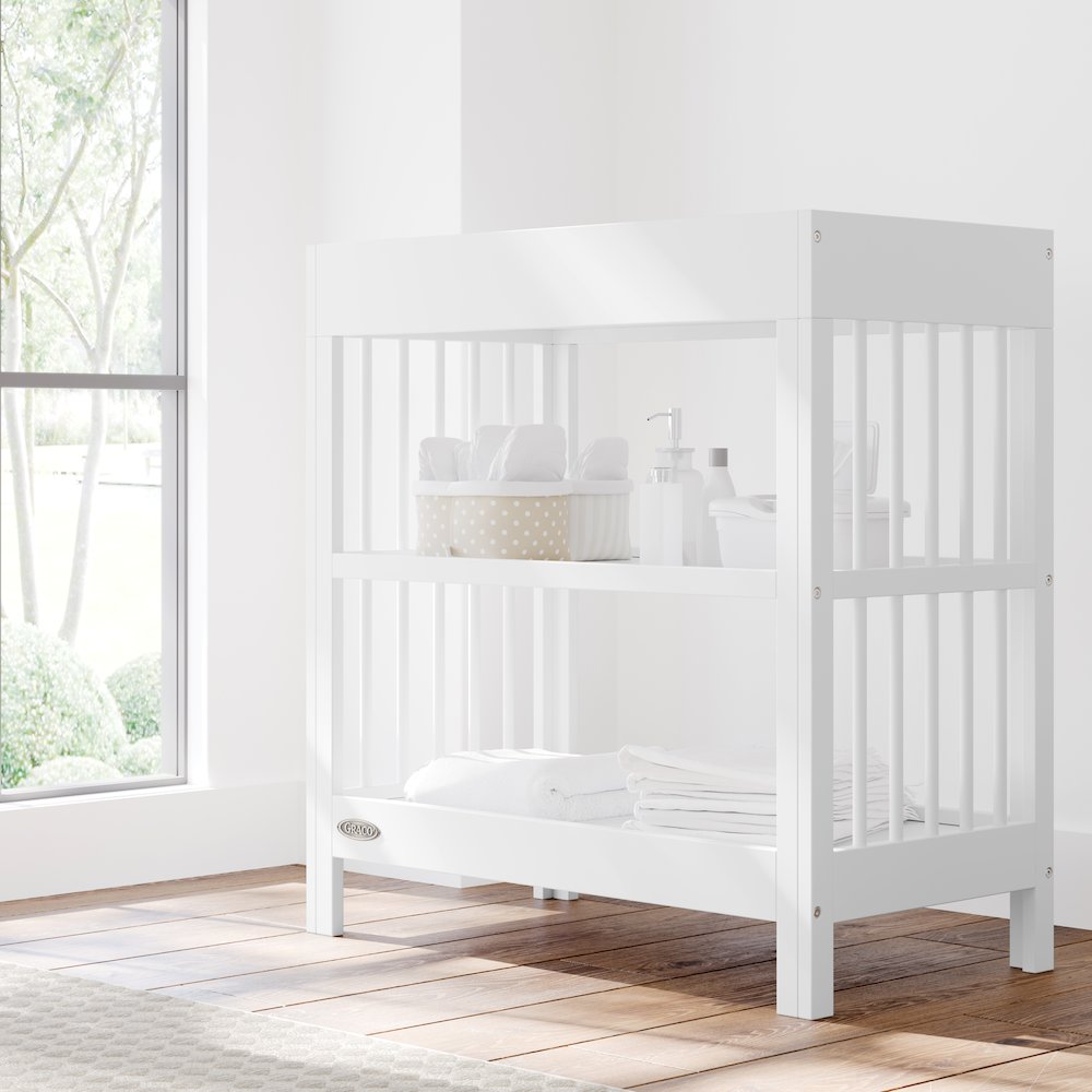 Graco Teddi Changing Table with Water-Resistant Changing Pad - White. Picture 2
