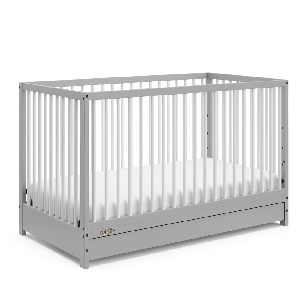 Graco Teddi 5-in-1 Convertible Crib with Drawer - Pebble Gray and White. Picture 1