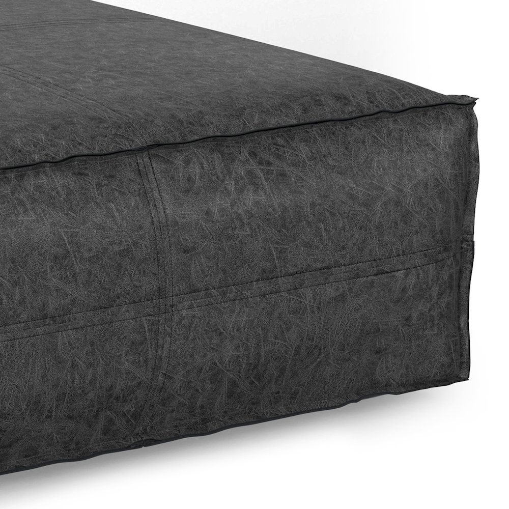 Brody Extra Large Coffee Table Pouf In Distressed Black Vegan Faux Leather. Picture 3