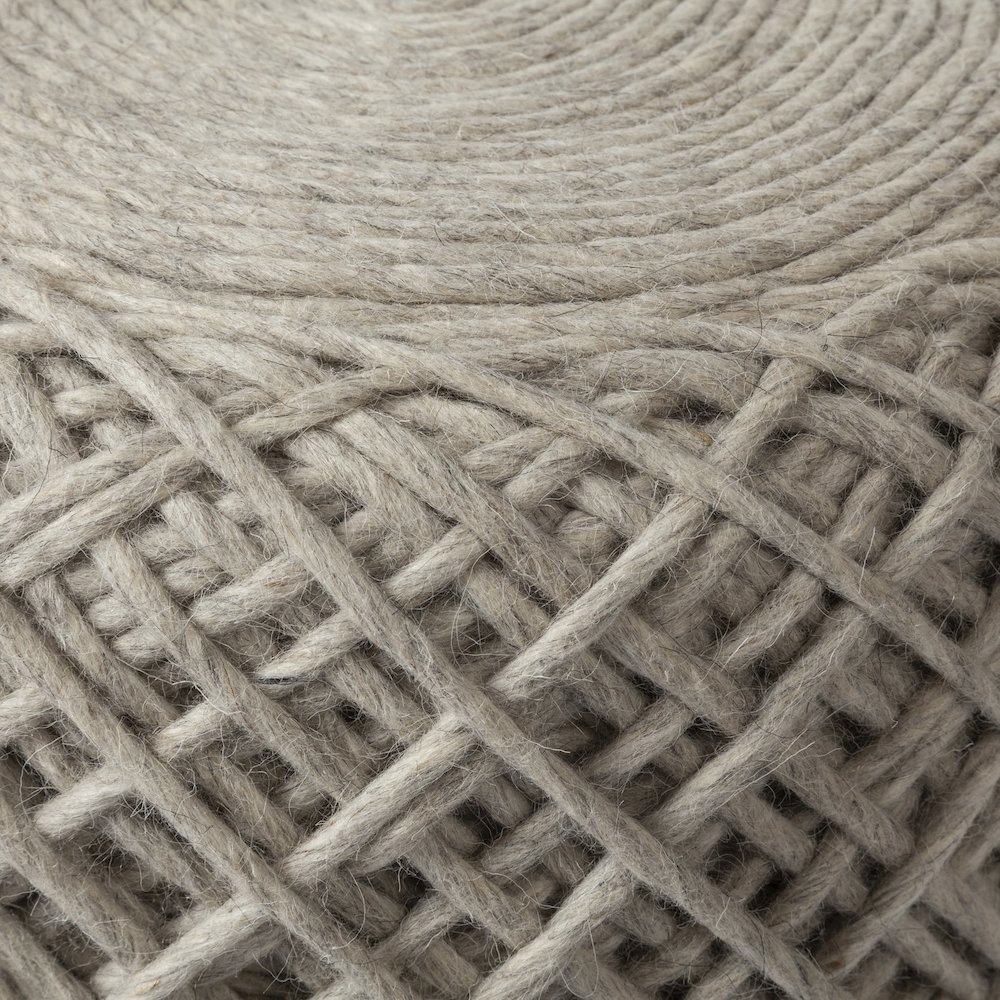 Allium Oatmeal Handwoven Wool Cylindrical Pouf. Picture 3