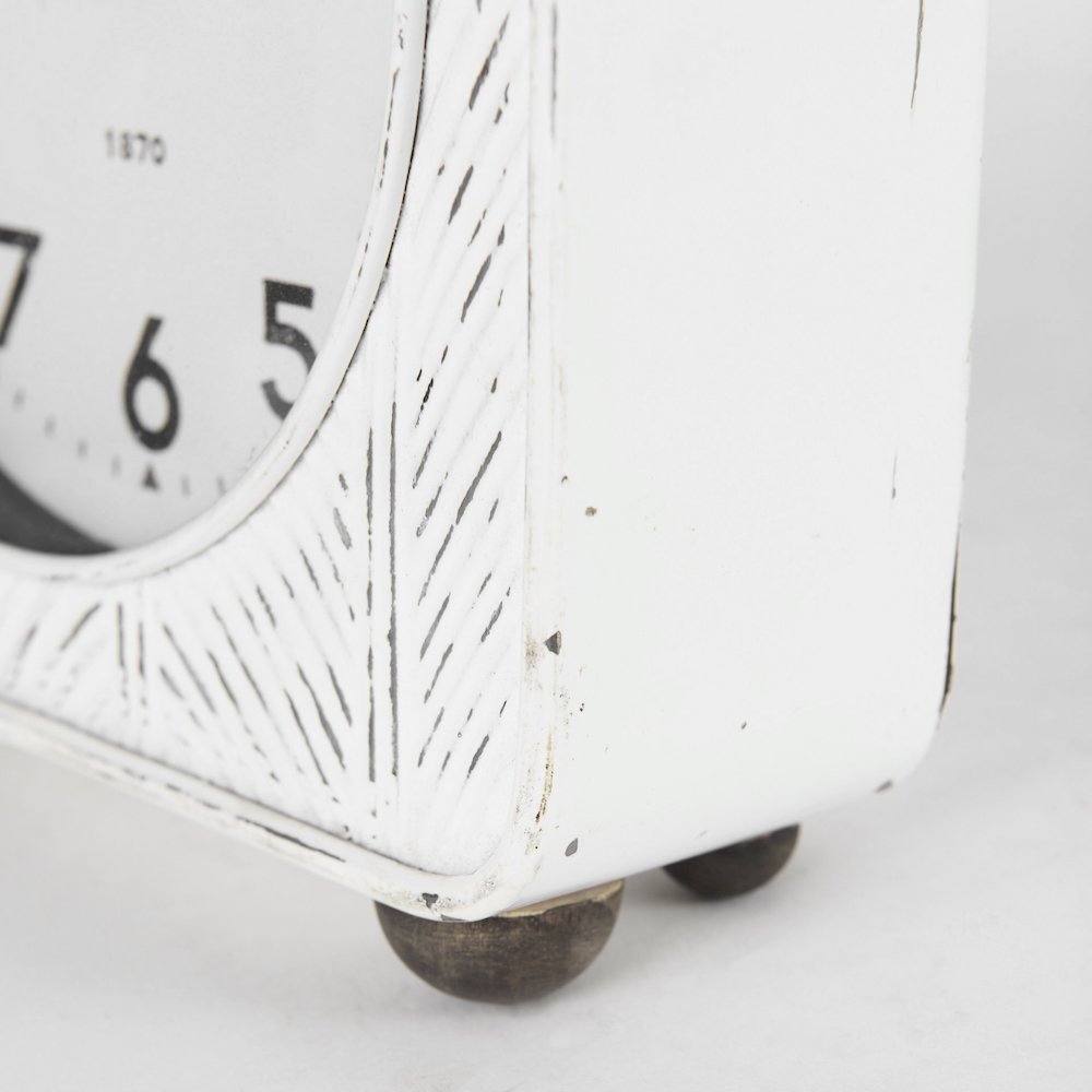 Karl 8.0L x 2.8W x 8.8H Rustic White Iron Rounded Square Table Clock. Picture 7