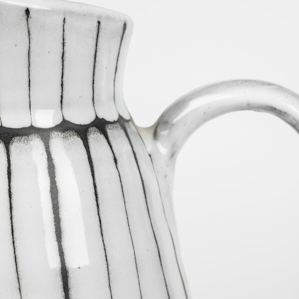 Lome Large White/Black Patterned Ceramic Water Pitcher. Picture 6
