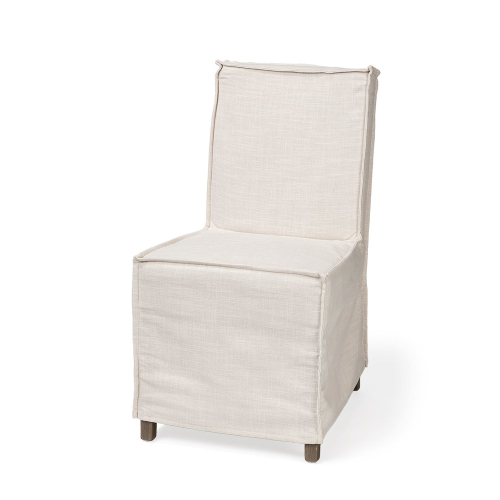 Cream Fabric Slip-Cover Brown Wooden Base Dining Chair. Picture 1