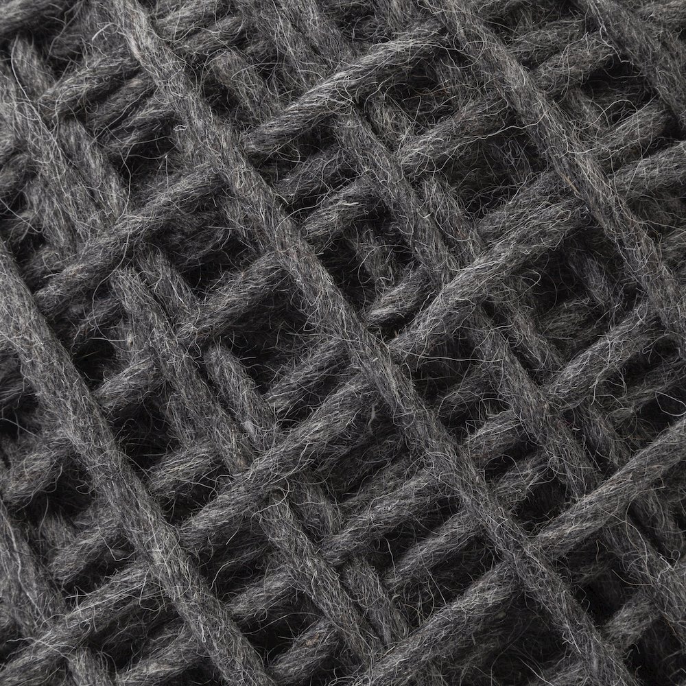 Allium Dark Gray Handwoven Wool Cylindrical Pouf. Picture 8