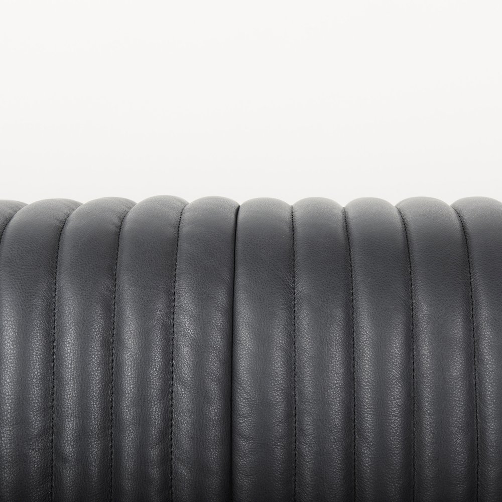 Ricciardo Black Leather Wrapped Three Seater Sofa 82.5L x 38.5W x 26.5H. Picture 10