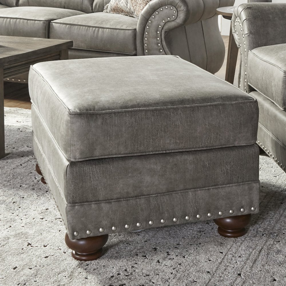 Leinster Faux Leather Upholstered Nailhead Ottoman in Stone Gray. Picture 2