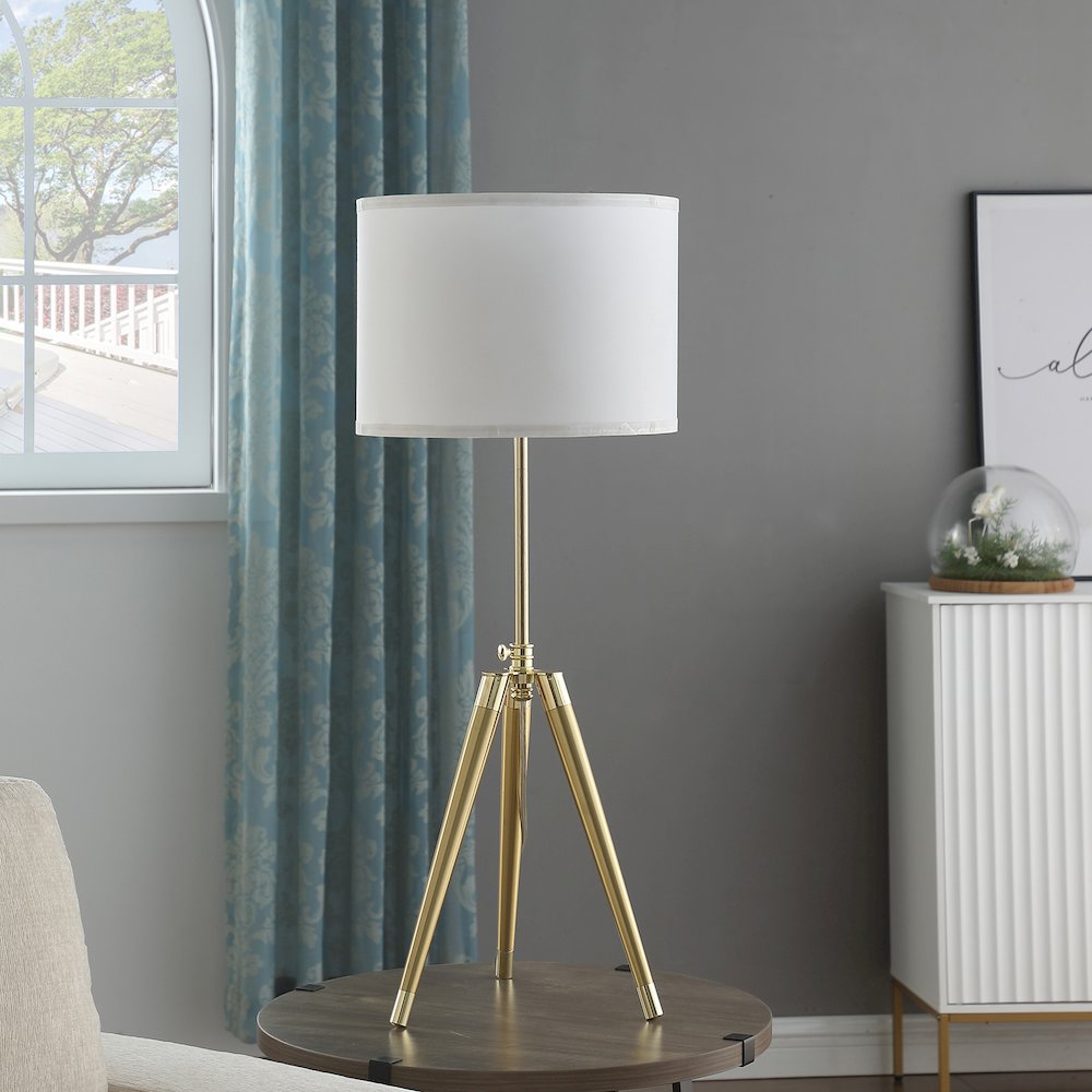 35.5" - 25.75"H Adjustable Hieght Brass/Shiny Gold Modern Tripod Table Lamp. Picture 7