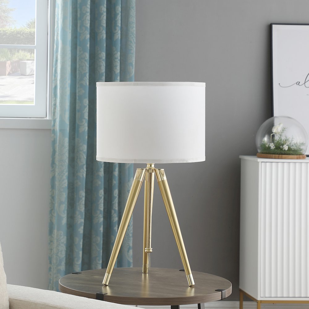 35.5" - 25.75"H Adjustable Hieght Brass/Shiny Gold Modern Tripod Table Lamp. Picture 5