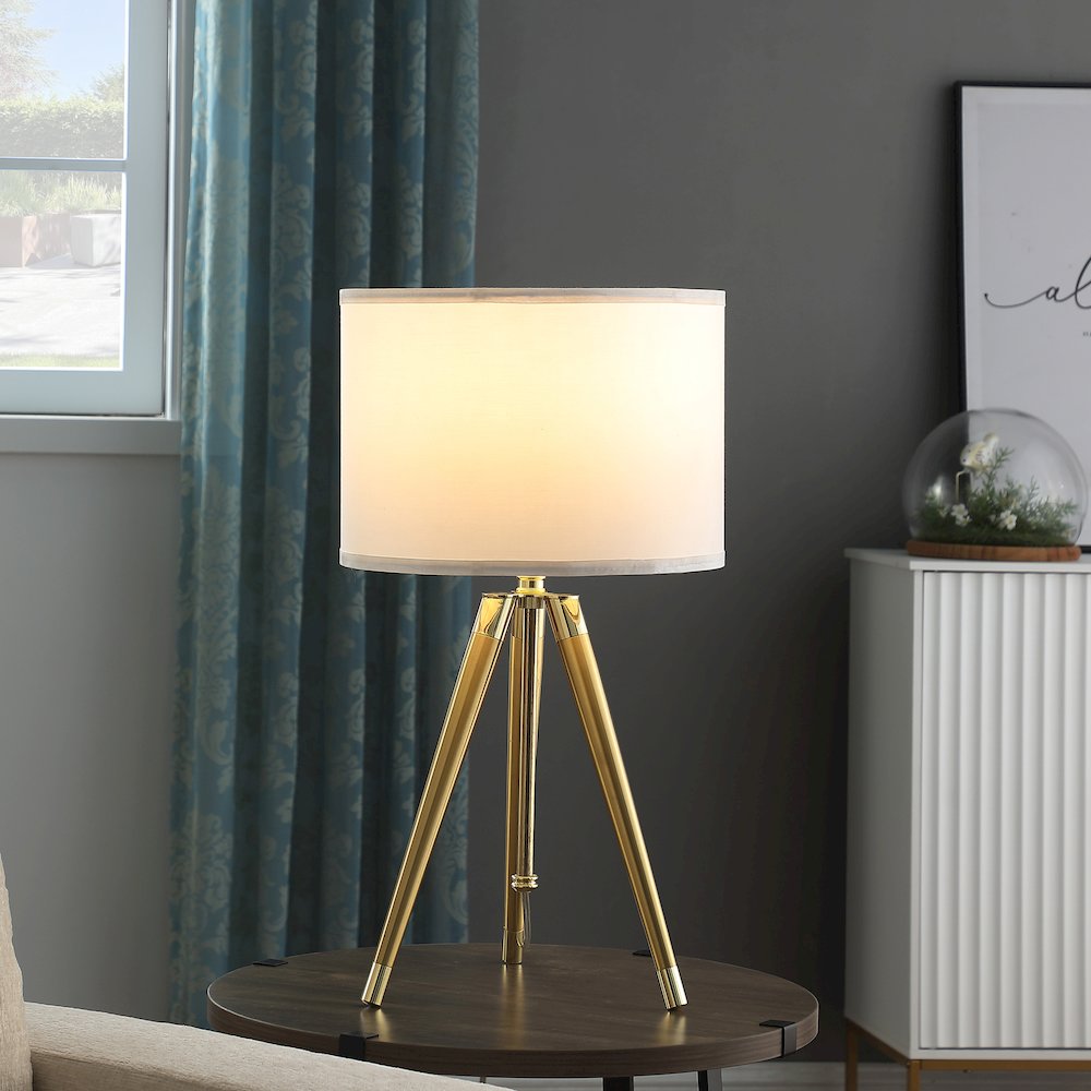 35.5" - 25.75"H Adjustable Hieght Brass/Shiny Gold Modern Tripod Table Lamp. Picture 6