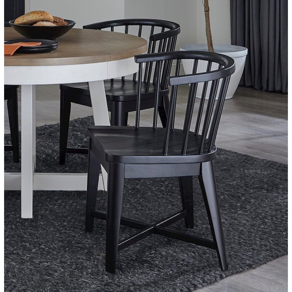 Modern Dining 48-66" Round Dining Table and 4 Black Barrel Chairs. Picture 9