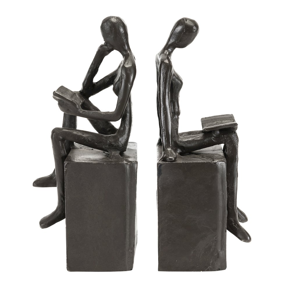 Man and Woman Reading on a Block Cast Iron Bookend Set. Picture 1