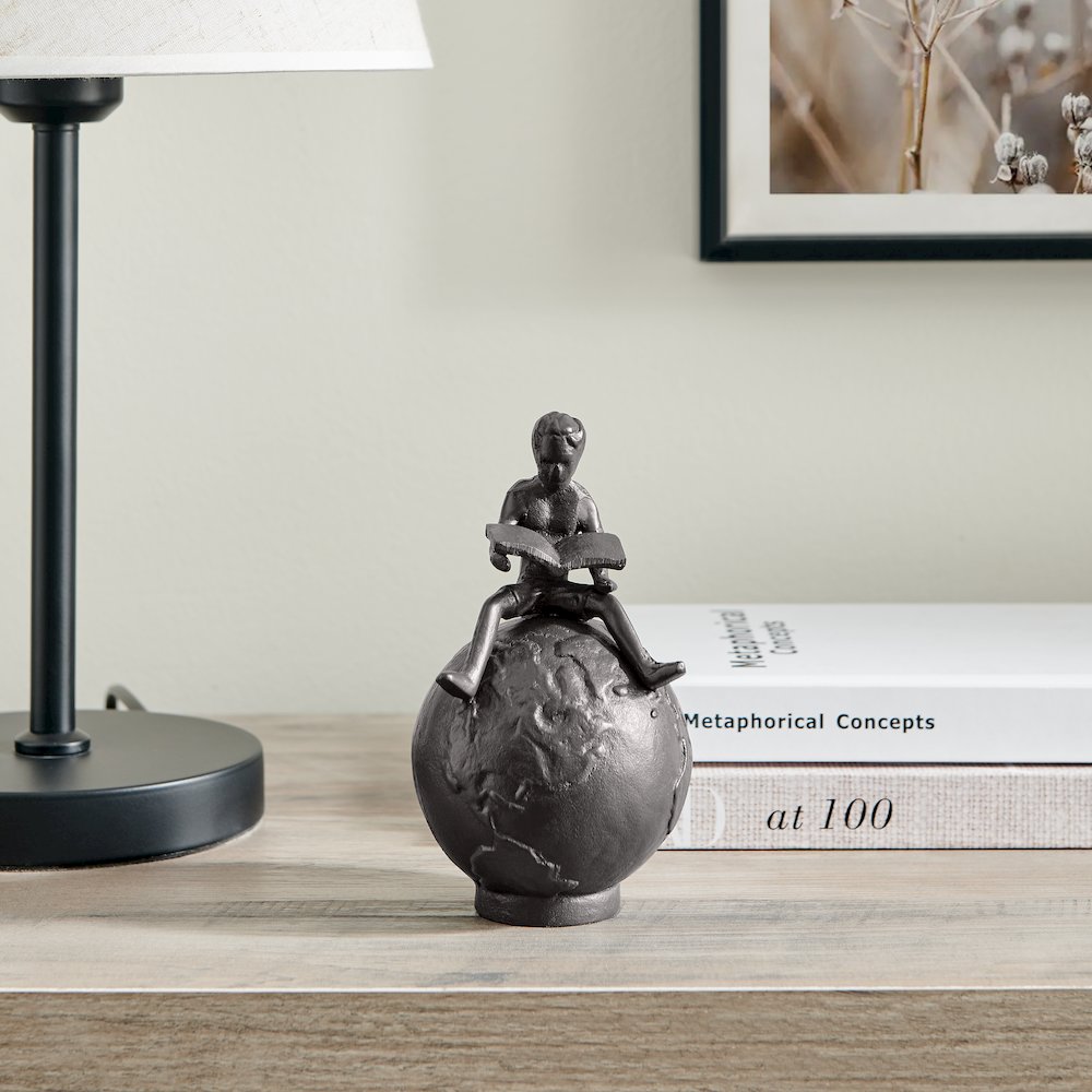 Brown Cast Iron Boy Reading on Globe Sculpture or Decorative Paperweight. Picture 3