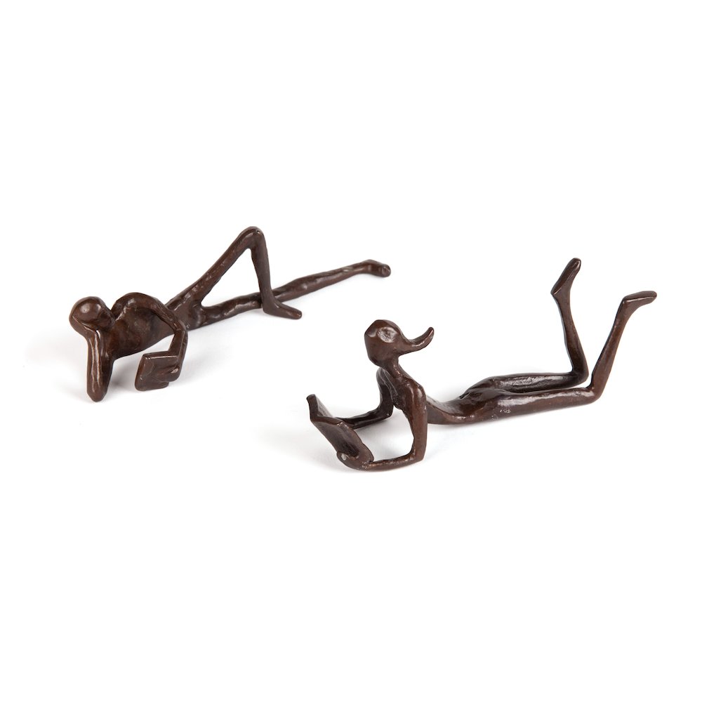 Man and Woman Leisurely Reading a Book Bronze Sculptures (2 piece set). Picture 1