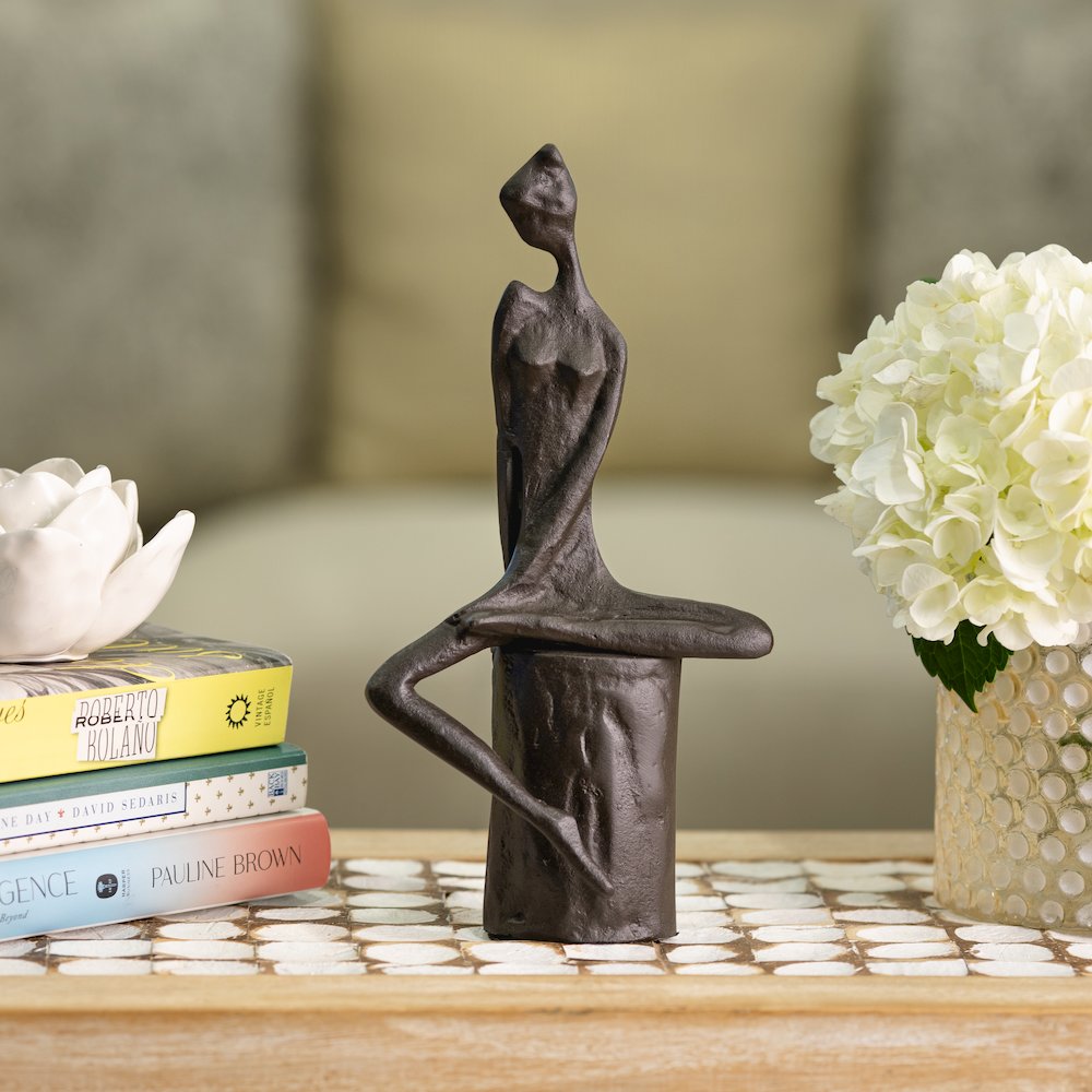 Woman in Reflection Cast Iron Sculpture. Picture 3