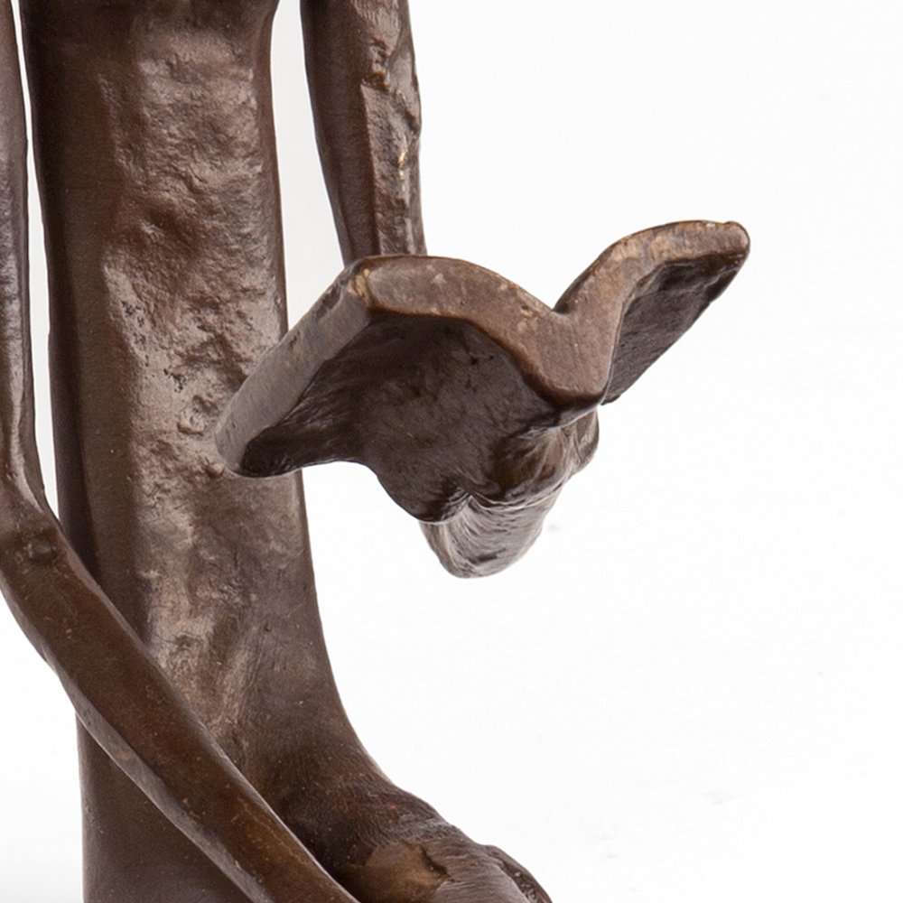 Woman Reading Over Ledge Cast Bronze. Picture 3