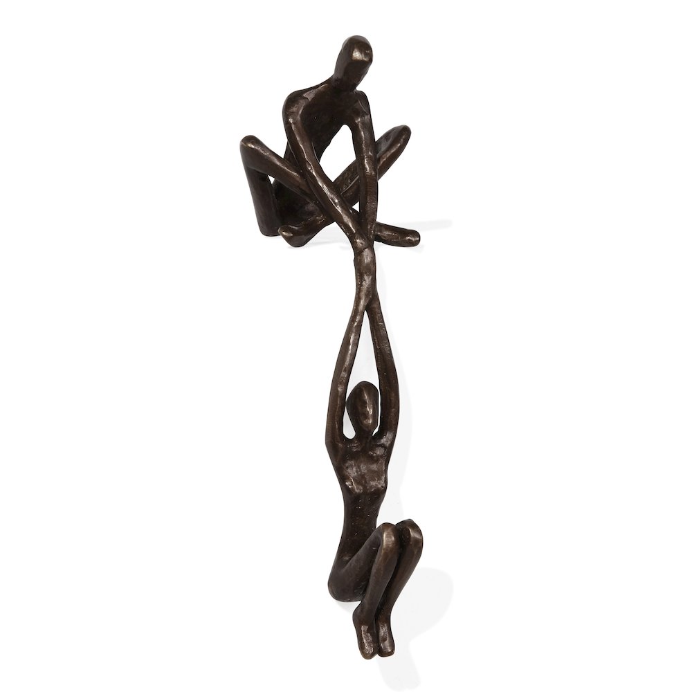 Man Lifting Woman from Ledge Bronze Sculpture. Picture 5
