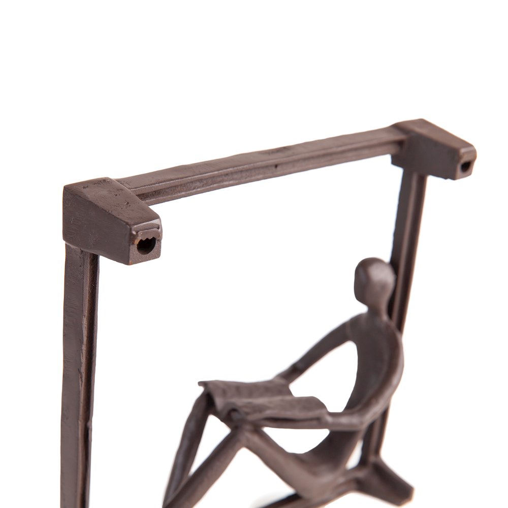 Man Reading on a Window Sill Hanging Wall Art Iron Sculpture. Picture 5