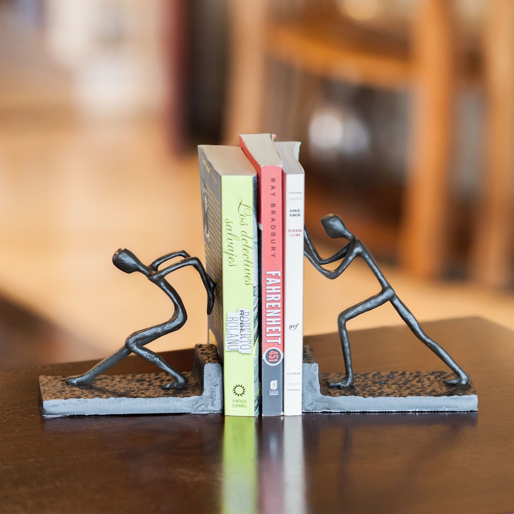 Men Pushing Metal Bookend Set. Picture 4