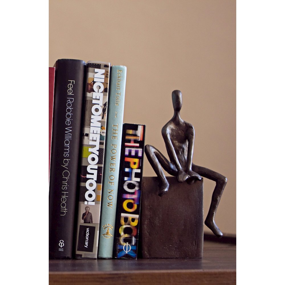 Bookend Set with Man and Woman Sitting on a Block. Picture 6