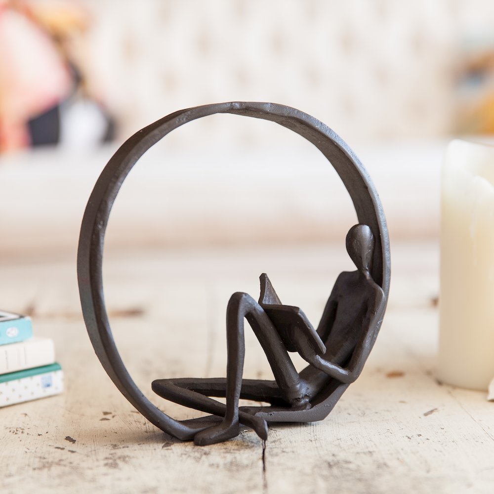 Encircled Reader Iron Sculpture. Picture 6
