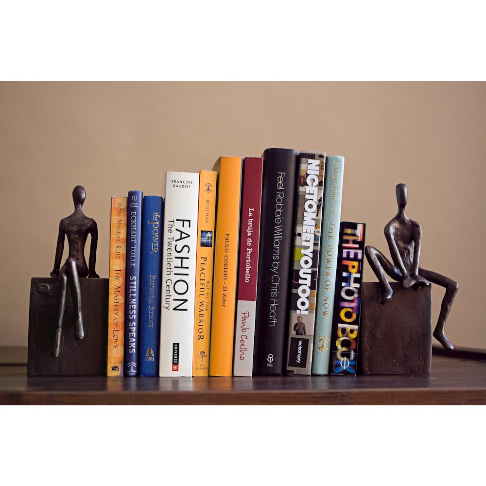 Bookend Set with Man and Woman Sitting on a Block. Picture 2