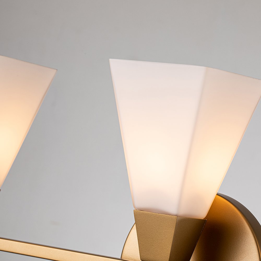 Bowtie 3 Light Bath Bar in Lacquered Gold. Picture 2