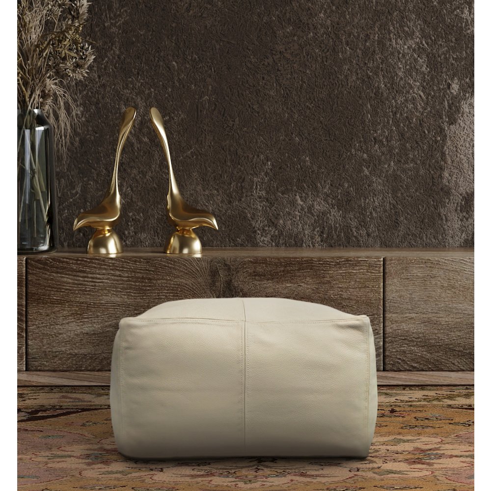 Mid-Century Java Leather Pouf in Ivory. Picture 6