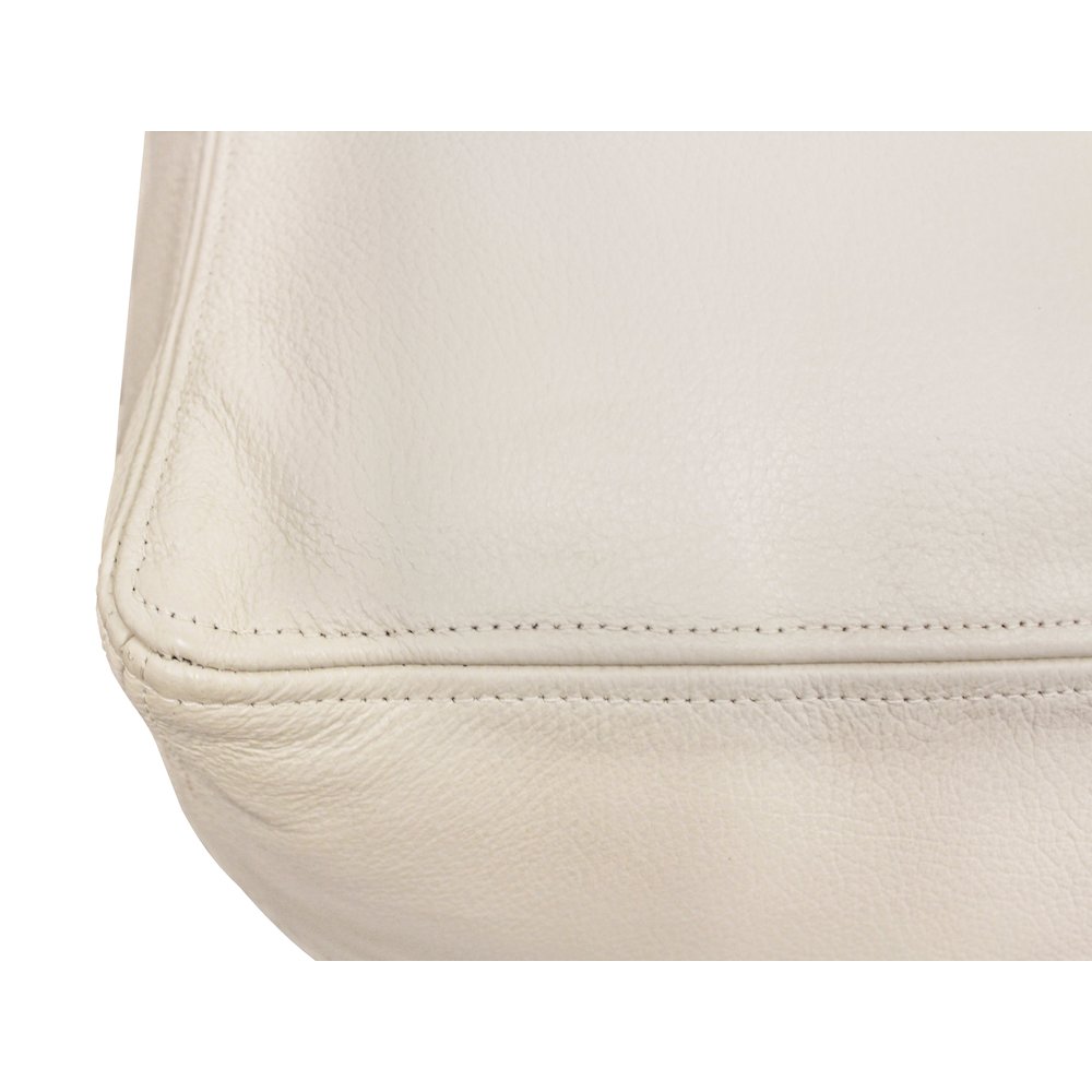 Mid-Century Java Leather Pouf in Ivory. Picture 5