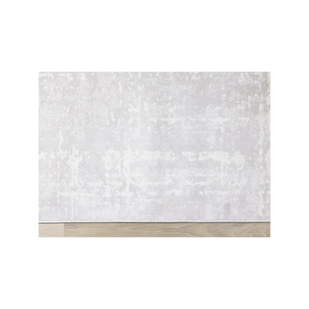 Holly Light Cream Distressed Textured Rug, 6'7" x 9'6". Picture 9