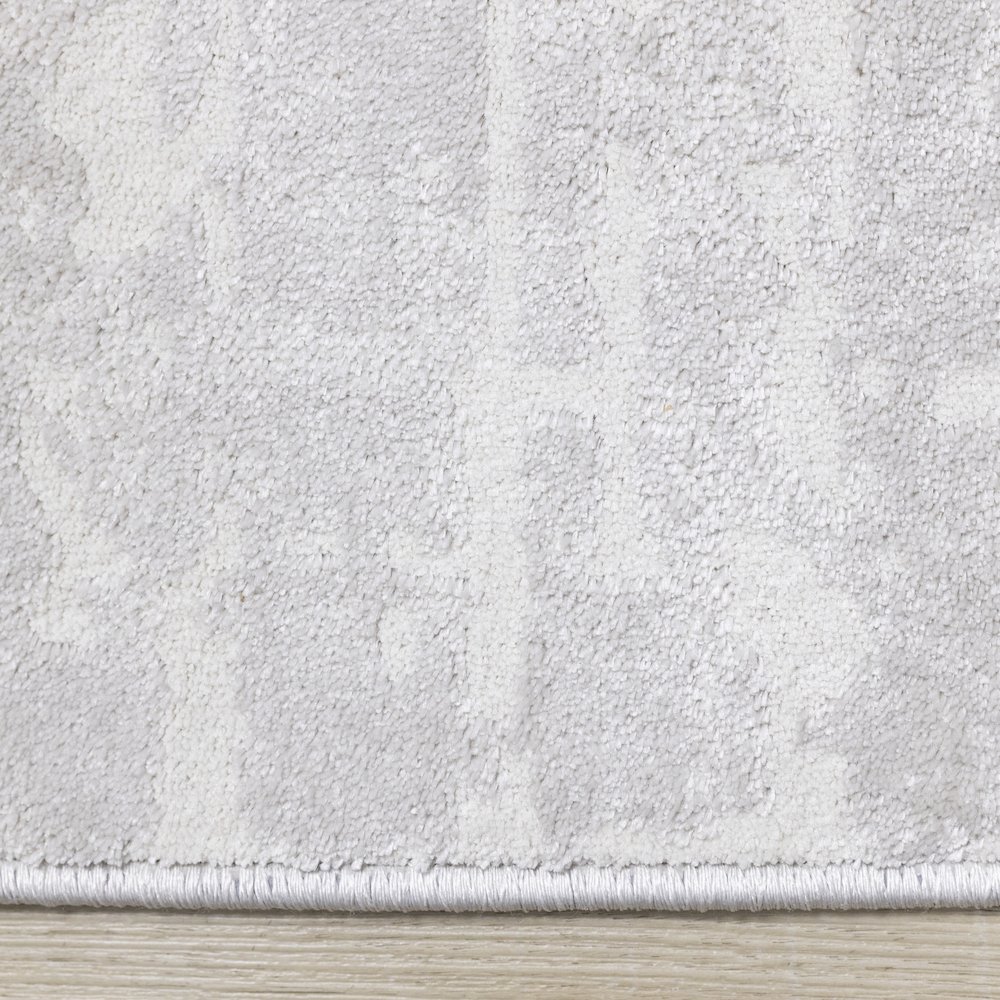 Holly Light Cream Distressed Textured Rug, 6'7" x 9'6". Picture 10
