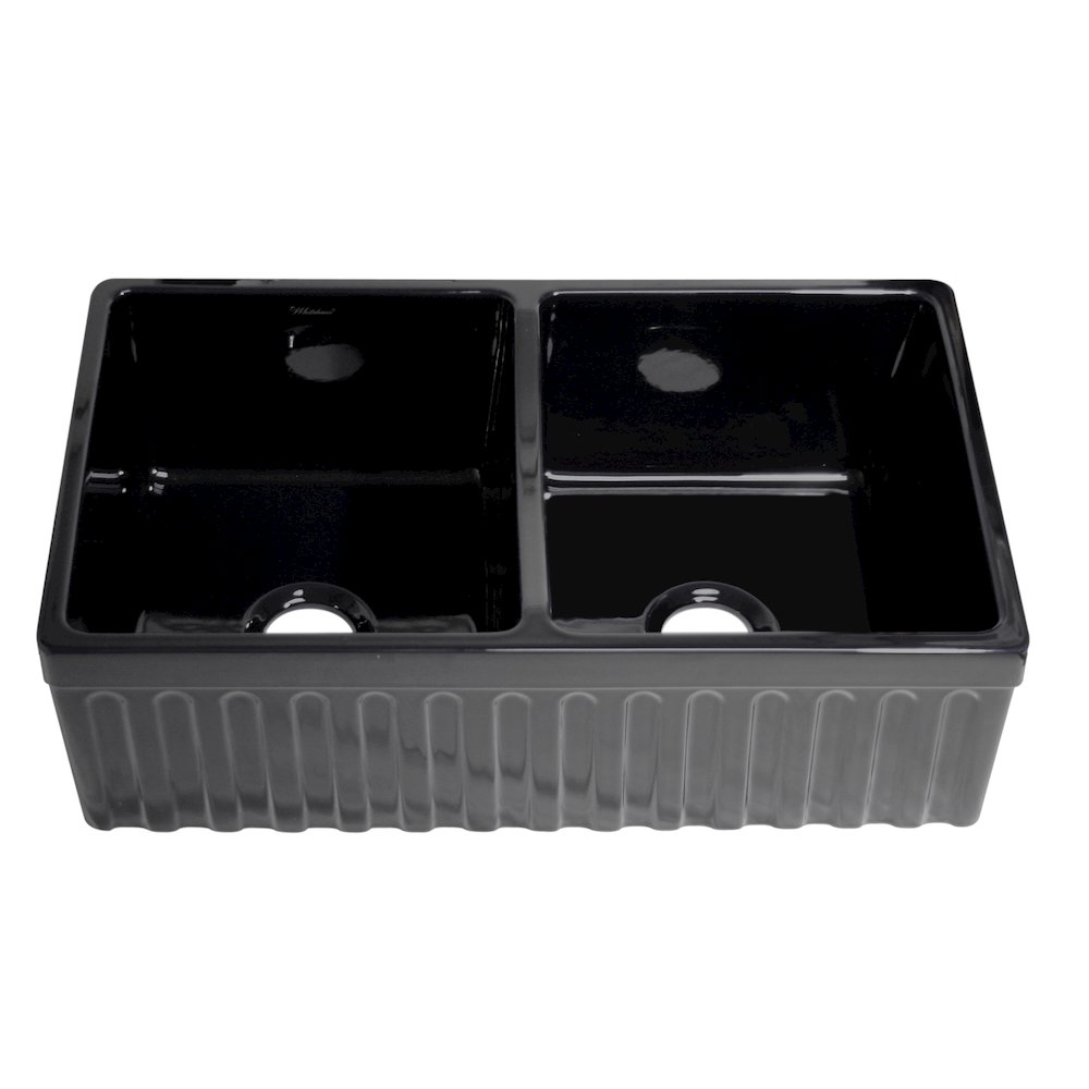 Farmhaus Fireclay Quatro Alcove Reversible Double Bowl Sink with a Fluted Front Apron and 2" Lip on One Side and 2 ½" Lip on the Opposite Side. Picture 1