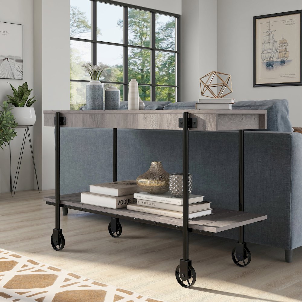 Acres Wood Natural Console Table with Metal Black Wheels. Picture 4