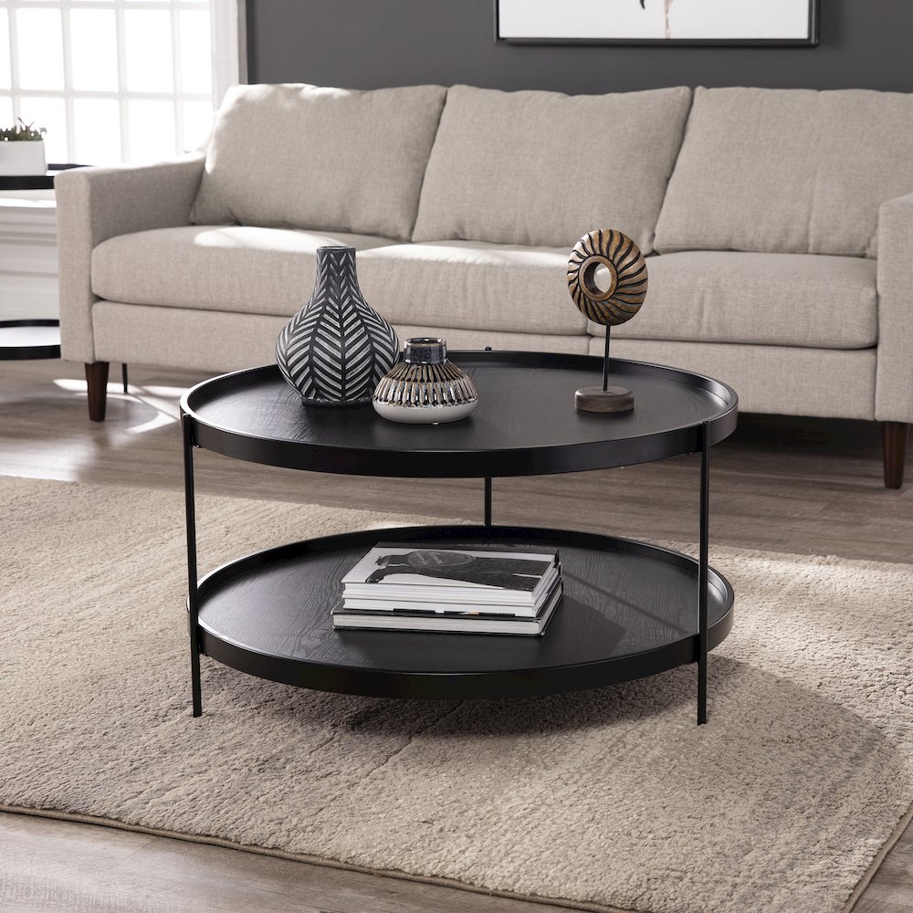 Verlington Round Farmhouse Style Cocktail Table. Picture 2