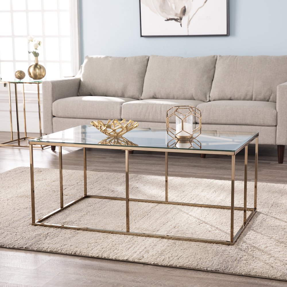 Nicholance Contemporary Glass-Top Cocktail Table in Gold Color. Picture 3