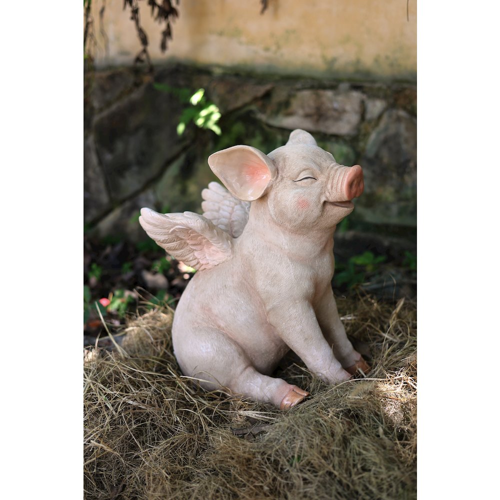 16.65" H Smiling Pig W/Wings Sitting. Picture 2