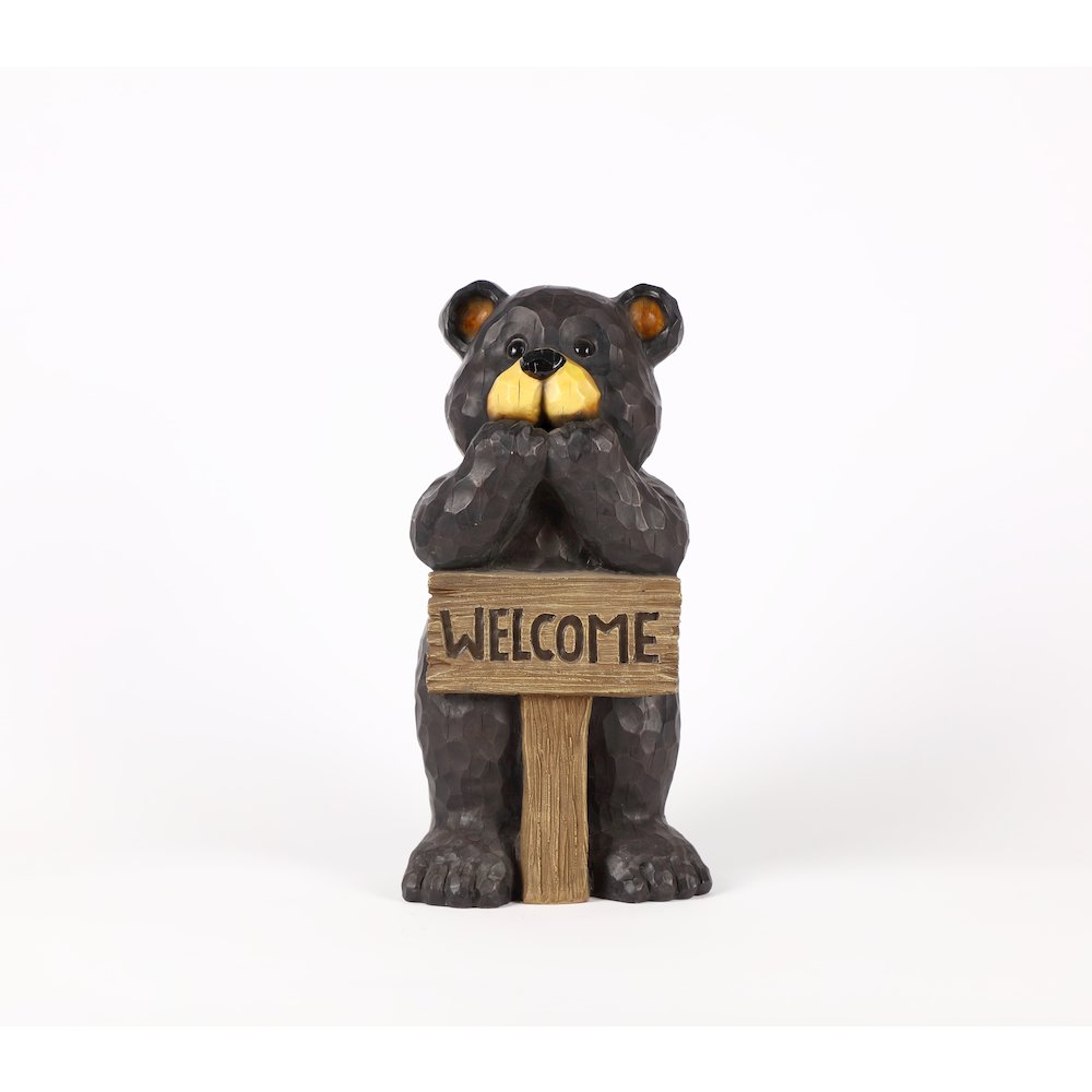 Bear Leans On Welcome Sign. Picture 1