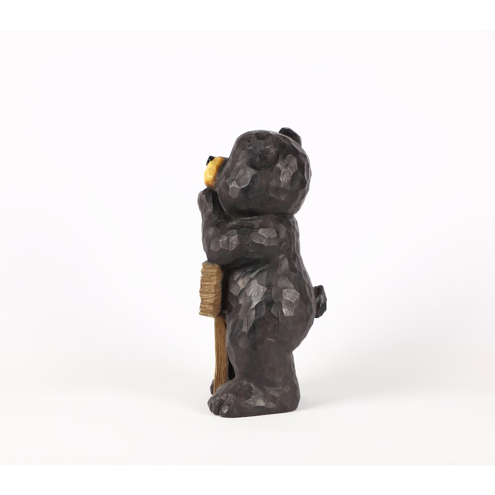 Bear Leans On Welcome Sign. Picture 4