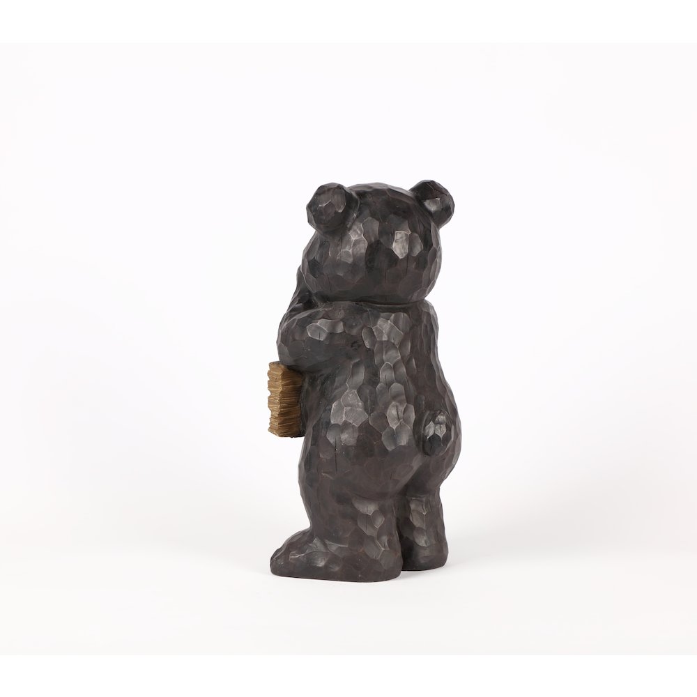 Bear Leans On Welcome Sign. Picture 3