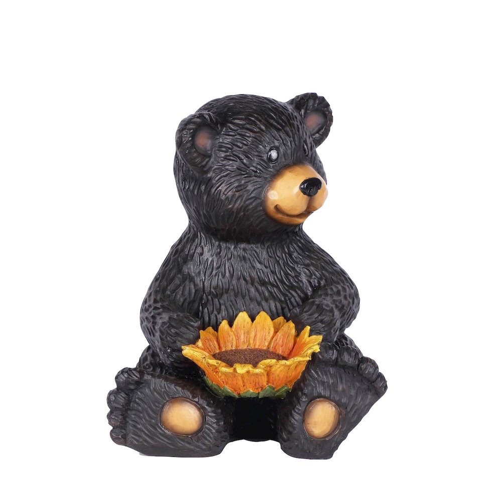 Bear Cub Holding Sunflower. Picture 1