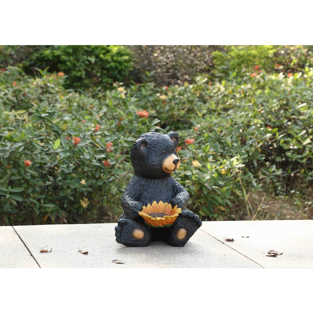 Bear Cub Holding Sunflower. Picture 7