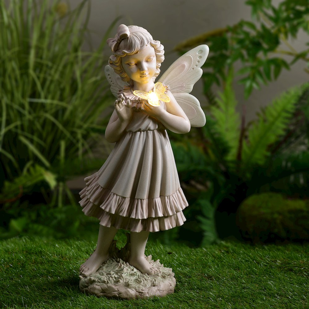Girl Holding Butterfly Lighted Garden Statue Solar Powered LEDs. Picture 2