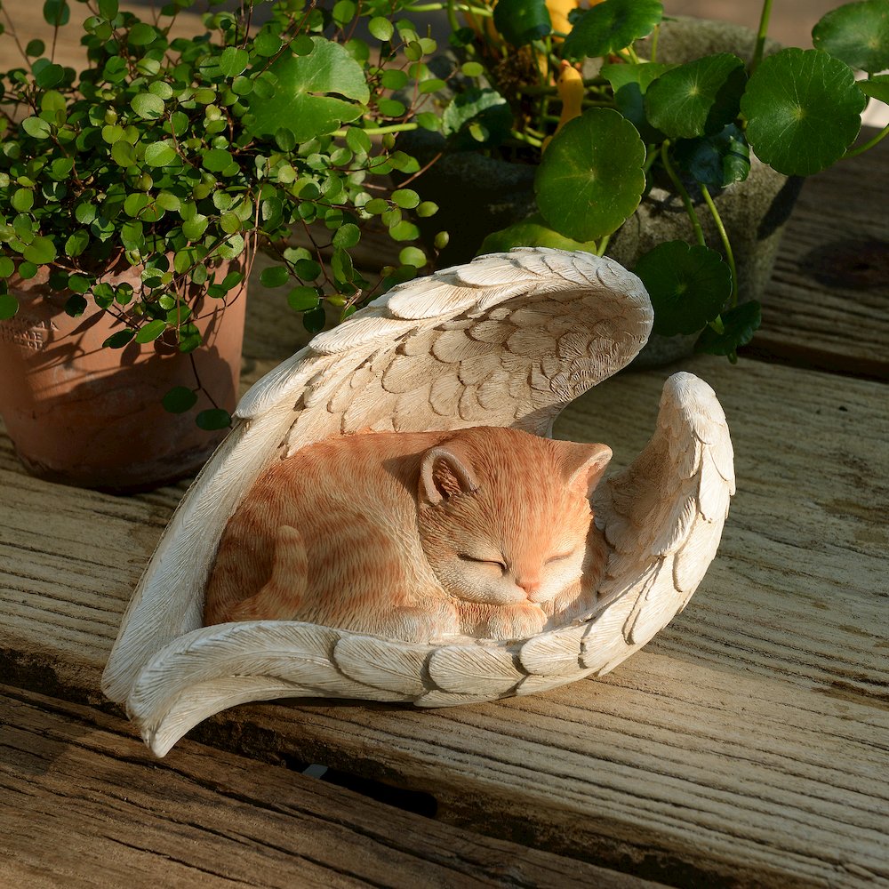 Citrus Seraph: Vibrant Orange Polyresin Angel Cat Figurine. Picture 2