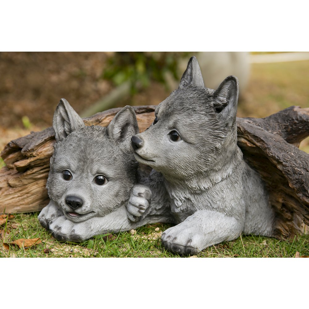 Grey Wolf Cubs Hiding Under Log Statue. Picture 7